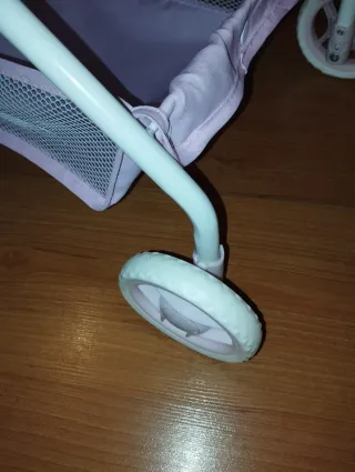 Carrito de muñecas rosa