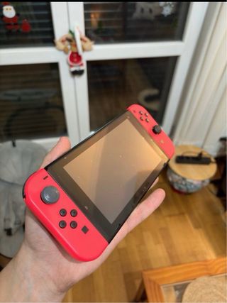 Nintendo Switch Roja y Azul con Juegos