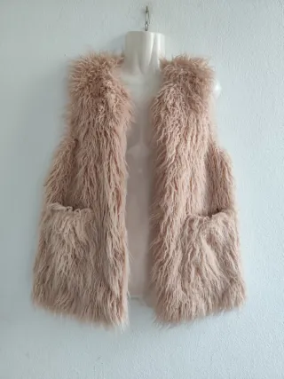 Chaleco pelo Zara Girls rosa palo.