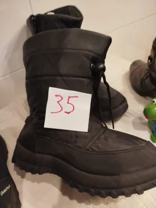 Botas descansos para la nieve negras