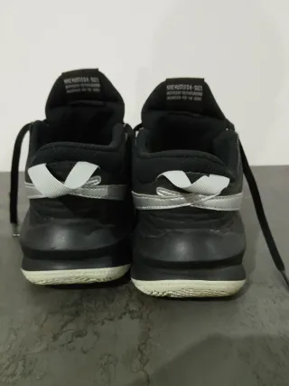 Scarpe Nike Hustle nere e argento