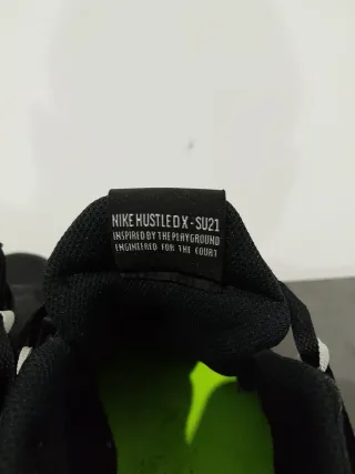 Scarpe Nike Hustle nere e argento