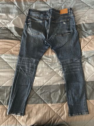 Jeans Bershka uomo blu strappati
