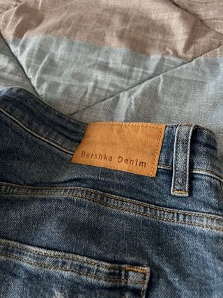 Jeans Bershka uomo blu strappati