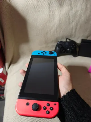 Nintendo Switch + Mando