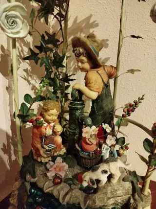 Lámpara decorativa con figuras