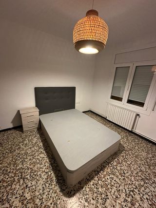 Cama canapé con cabecero tapizado