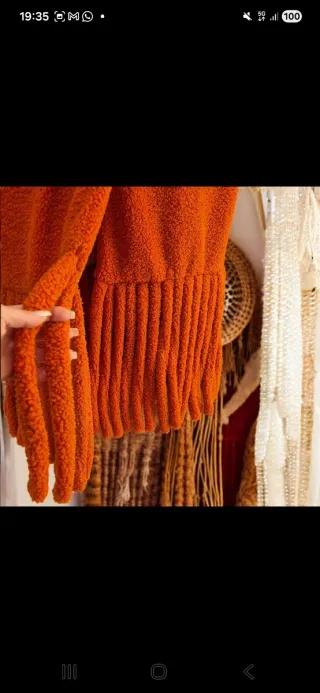 Cappotto arancione lungo con frange