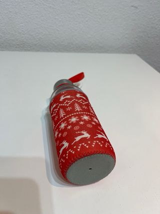 Botella de cristal con funda navideña