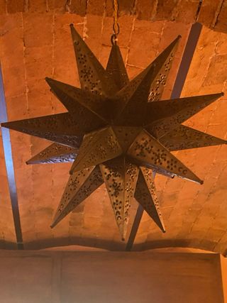 Lampadario a stella metallo traforato in rame