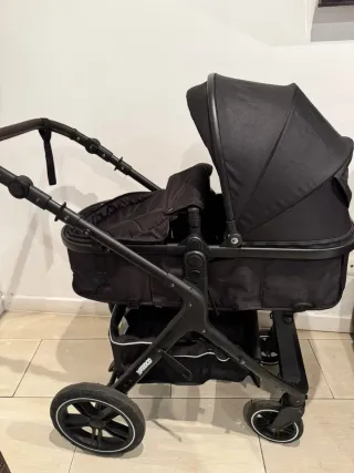 Carrito 3 en 1 de bebé negro y pañalera