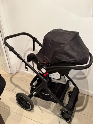 Carrito 3 en 1 de bebé negro y pañalera