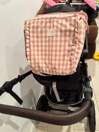 Carrito 3 en 1 de bebé negro y pañalera