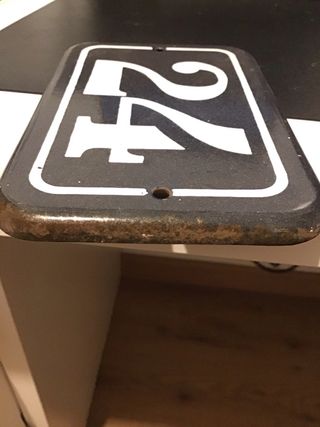 Placa número 24 antigua