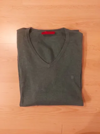 Jersey pico verde Carolina Herrera