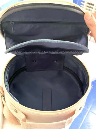 Neceser redondo beige con flor