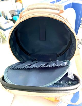 Neceser redondo beige con flor