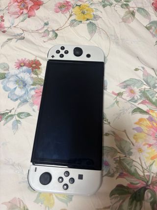 Nintendo Switch OLED Blanca con 3juegos como nueva