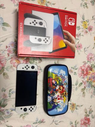 Nintendo Switch OLED Blanca con 3juegos como nueva