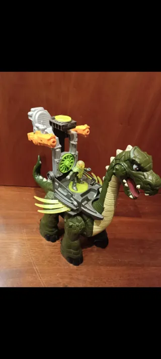 Dinosaurio Apatosaurio con muñeco