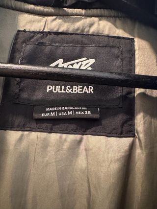 Chaqueta Bomber de color negro y caqui. Talla M