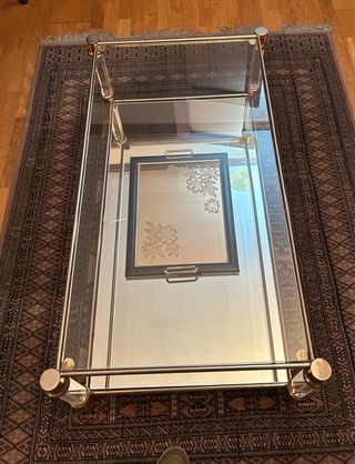 Mesa centro cristal - metal dorado.