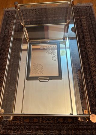 Mesa centro cristal - metal dorado.