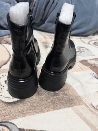 Botines de piel de vaca negros mujer