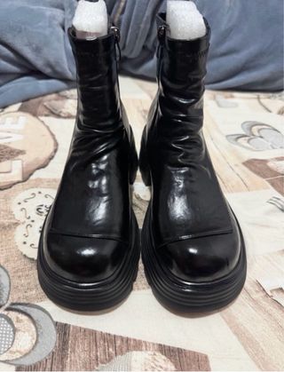 Botines de piel de vaca negros mujer