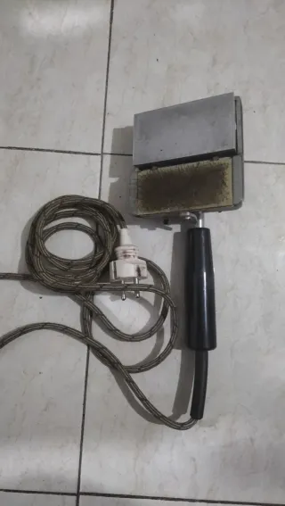 Máquina de planchar antigua