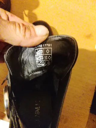 Stivaletti neri con fibbie