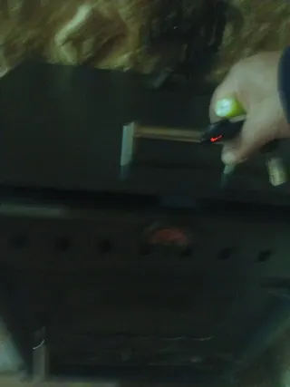 Estufa de leña negra y 4 tubos de vitrificado y t