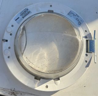 Puerta lavadora blanca