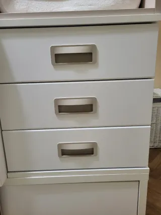 Cuna convertible con cambiador