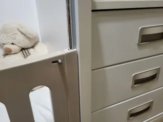 Cuna convertible con cambiador