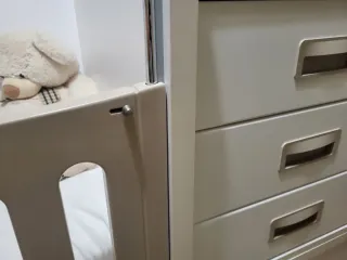 Cuna convertible con cambiador