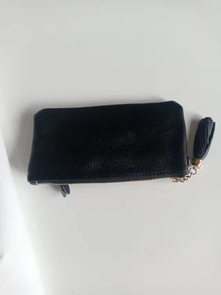 Cartera de piel tipo monedero negra