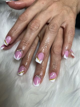 Uñas acrílicas oro y blanco negro