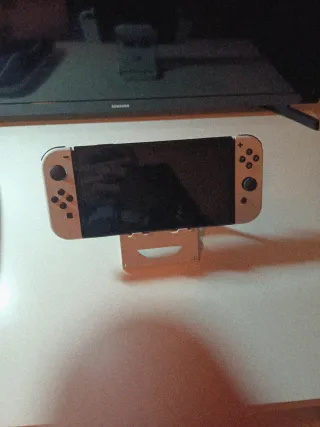 Nintendo Switch OLED + 7 Accesorios