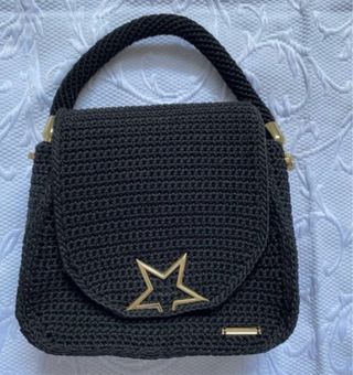 Bolso negro ganchillo estrella dorada