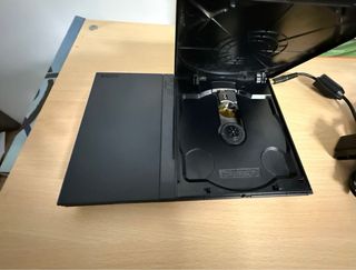 PlayStation 2 Slim Nera + 2 Giochi