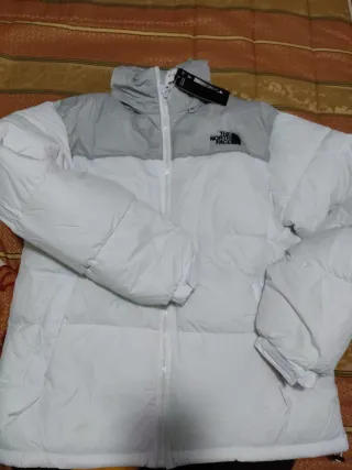 Chaqueta The North Face gris y blanca