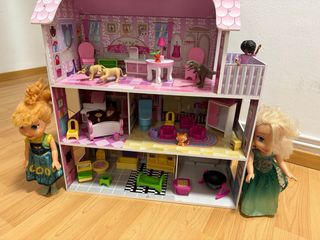 Casa de muñecas rosa de 3 plantas