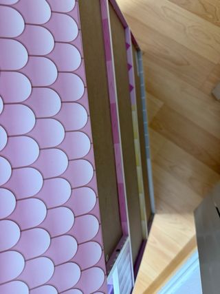 Casa de muñecas rosa de 3 plantas