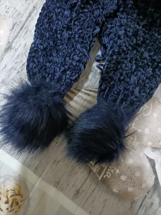 Sciarpa blu con pompon