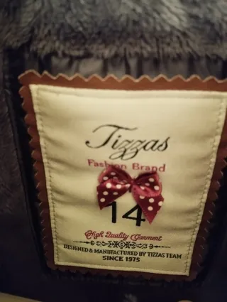 Tizzas plumífero gris/marrón oscuro con capucha