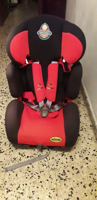 Silla coche bebé Midas roja.No envio