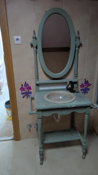 Mueble de baño con espejo ovalado