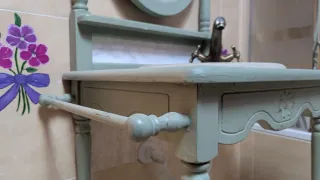 Mueble de baño con espejo ovalado