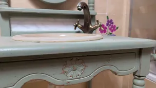 Mueble de baño con espejo ovalado